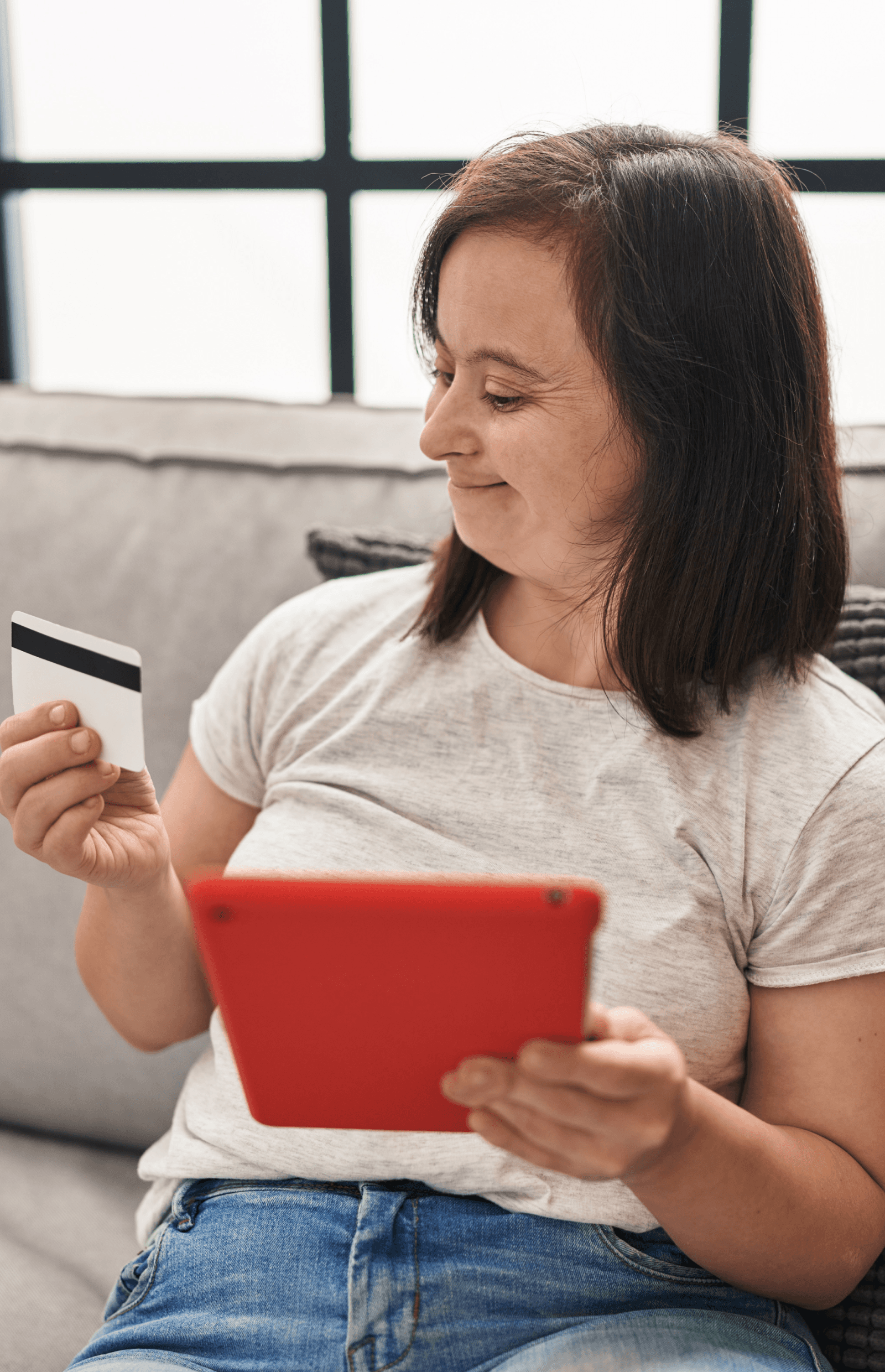A person using an ipad to bank online